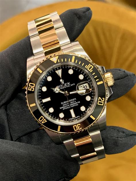 rolex submariner bauhöhe|Rolex Submariner gold watch.